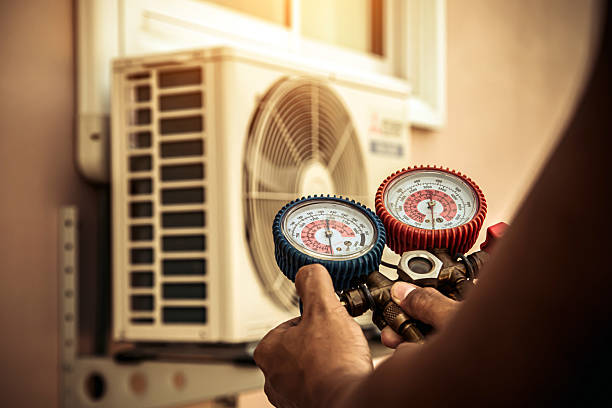 Professional Hvac Maintenance technician working in Norwood, MA